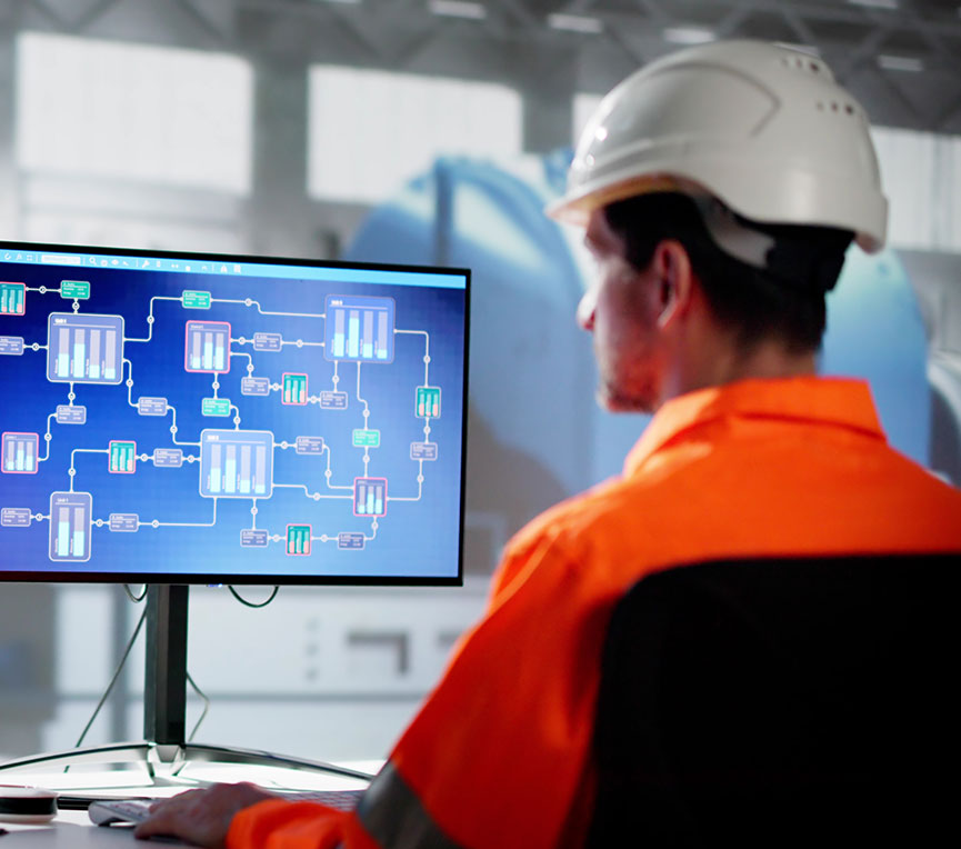 Utility worker at a computer